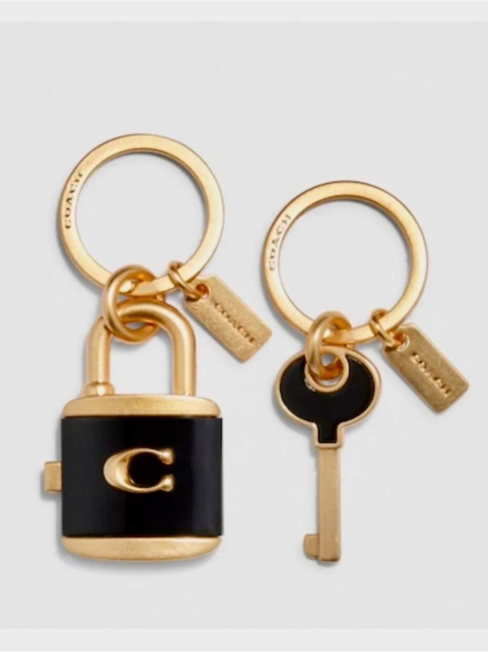 Coach Black and Gold Padlock & Key Keyring Duo